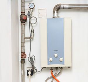 A tankless water heater in Yonkers, NY -- installation in an attic space.